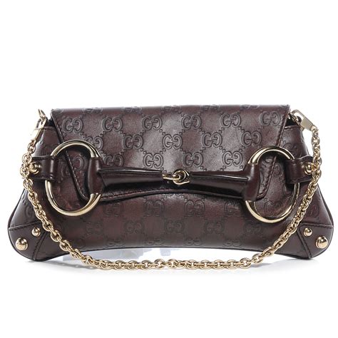 gucci guccissima clutch.